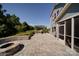 Relaxing backyard featuring a patio with a built-in fire pit, pergola, and hot tub at 2035 Beacon Ave, Monroe, NC 28110
