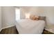 Cozy bedroom with a plush bed and decorative pillows, creating a relaxing atmosphere at 2035 Beacon Ave, Monroe, NC 28110
