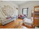 Shared bedroom with bunk beds, wood floors, and a cozy sleeping area at 211 S Rowan Ave, Spencer, NC 28159