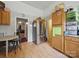 Efficient kitchen layout with stainless steel refrigerator and dining area access at 211 S Rowan Ave, Spencer, NC 28159