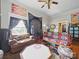 Eclectic living room featuring a unique decor and comfortable seating arrangement at 211 S Rowan Ave, Spencer, NC 28159