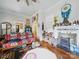 Inviting living room featuring wood floors, fireplace and decorative items at 211 S Rowan Ave, Spencer, NC 28159