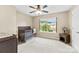 Bedroom with a crib, changing table, and a window providing natural light at 225 Tasman Dr, Mount Holly, NC 28120