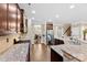 Modern kitchen with granite countertops, stainless steel appliances, and ample cabinet storage at 225 Tasman Dr, Mount Holly, NC 28120