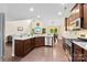 Spacious kitchen with granite counters, stainless appliances, and an open flow to the living area at 225 Tasman Dr, Mount Holly, NC 28120