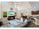 Inviting living space with tall windows, vaulted ceilings, and an adjacent dining area at 225 Tasman Dr, Mount Holly, NC 28120