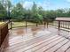 Large wooden back deck with railing and wooded views at 263 Lauren Pines Dr, York, SC 29745