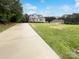 Charming home featuring a long driveway, well-maintained landscaping, and a detached garage at 263 Lauren Pines Dr, York, SC 29745