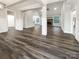 Spacious living room boasts an open layout, fireplace, and hardwood floors at 263 Lauren Pines Dr, York, SC 29745