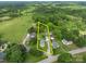 Expansive aerial view showcasing the property's boundaries and lush surroundings of trees at 3345 Long Ferry Rd, Salisbury, NC 28146