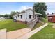 Exterior side view of house, showcasing a ramp for easy access at 3345 Long Ferry Rd, Salisbury, NC 28146