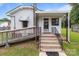 Front view of home with a ramp and staircase leading to the entrance at 3345 Long Ferry Rd, Salisbury, NC 28146