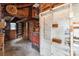 Outbuilding interior showcases ample space for storage and projects, with a mix of open shelving and tool storage at 3345 Long Ferry Rd, Salisbury, NC 28146