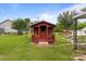 Cozy backyard shed with a quaint porch, ideal for relaxation or as a private workspace with seating at 3345 Long Ferry Rd, Salisbury, NC 28146