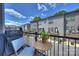 Relaxing balcony view with outdoor seating and a grill, perfect for enjoying the neighborhood scenery at 3722 Ellington St, Charlotte, NC 28211