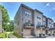Modern townhome featuring a private balcony and attached garage at 3722 Ellington St, Charlotte, NC 28211