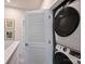 Efficient laundry area with stacked washer and dryer units for space-saving convenience at 3722 Ellington St, Charlotte, NC 28211