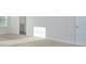 Carpeted bedroom with a bathroom and window to the outside; bright light shines through at 427 Carolina Hemlock Dr, Locust, NC 28097