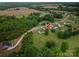An aerial view of the home's setting, showing the lawn, trees and proximity to other homes at 5129 Whitetail Ct, Crouse, NC 28033