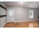 An inviting entryway offers ample storage with coat hooks and a window for natural light at 5129 Whitetail Ct, Crouse, NC 28033