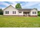 Charming single-Gathering home featuring vinyl siding, red brick foundation, and a well-maintained front lawn at 5129 Whitetail Ct, Crouse, NC 28033