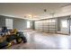 This large garage offers ample space for parking and storage and natural lighting at 5129 Whitetail Ct, Crouse, NC 28033