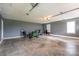 This large garage offers ample space for parking and storage and natural lighting at 5129 Whitetail Ct, Crouse, NC 28033