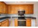 Well-equipped kitchen featuring stainless steel appliances and solid surface countertops at 5129 Whitetail Ct, Crouse, NC 28033