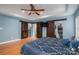 Main bedroom showcasing a vaulted ceiling, barn doors, and spacious walk-in closets at 5129 Whitetail Ct, Crouse, NC 28033