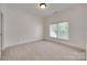 Bright bedroom featuring carpeting, a large window, and neutral walls at 5164 Mill Race Ln, Lancaster, SC 29720