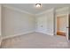 Bedroom with neutral carpet and double-door closet at 5164 Mill Race Ln, Lancaster, SC 29720