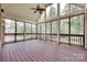 Inviting screened porch with high ceilings, offering a relaxing outdoor living space at 5164 Mill Race Ln, Lancaster, SC 29720