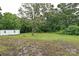 Expansive backyard with storage shed at 5222 Sikes Mill Rd, Monroe, NC 28110