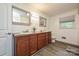 Updated bathroom featuring double sinks and ample cabinet space at 5222 Sikes Mill Rd, Monroe, NC 28110