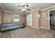 Comfortable bedroom with carpet, natural light, and closet at 5222 Sikes Mill Rd, Monroe, NC 28110