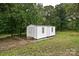 Exterior view of a white shed at 5222 Sikes Mill Rd, Monroe, NC 28110