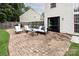 Backyard patio area with brick pavers and comfortable outdoor seating at 5741 Bentgrass Run Dr, Charlotte, NC 28269