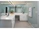 Spacious bathroom with dual sinks, ample counter space, and modern fixtures, offering comfort and style at 5741 Bentgrass Run Dr, Charlotte, NC 28269