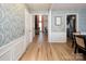 Spacious entryway with detailed molding and views of living and dining areas at 5741 Bentgrass Run Dr, Charlotte, NC 28269