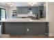 The kitchen features shaker cabinets, stainless steel appliances, white countertops, and a spacious island at 5741 Bentgrass Run Dr, Charlotte, NC 28269