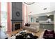 Spacious living room with fireplace, two-story ceiling, neutral paint and flooring at 5741 Bentgrass Run Dr, Charlotte, NC 28269