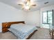 Bedroom with large bed, carpet, ceiling fan, and furniture at 5809 Sharon Rd # G, Charlotte, NC 28210