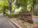 Brick Southwood community sign with landscaping located along a paved road at 5809 Sharon Rd # G, Charlotte, NC 28210