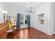 Bright bedroom featuring built-in storage, hardwood floors, and a comfortable atmosphere at 606 1St W St, Conover, NC 28613