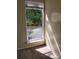 A bright bedroom window overlooking a green, leafy outdoor space at 7107 Stonington Ln, Charlotte, NC 28227
