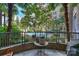 Enjoy serene condo views from this patio overlooking the pool and landscaped courtyard at 718 W Trade St # 105, Charlotte, NC 28202