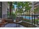 Condo patio boasts lush greenery with views of the community pool, perfect for relaxing outdoors at 718 W Trade St # 105, Charlotte, NC 28202