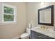 Bathroom features granite countertops and modern fixtures at 7725 Whitmire Ln, Mint Hill, NC 28227