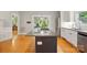 Kitchen island with cooktop and stainless steel appliances at 7725 Whitmire Ln, Mint Hill, NC 28227