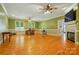 Spacious living room with fireplace and hardwood floors at 7725 Whitmire Ln, Mint Hill, NC 28227